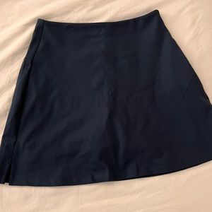 Size S Girlfriend Collective athletic skort in navy